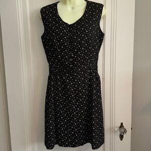Homemade/handmade black polyester sleeveless dress with white floral print
